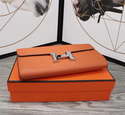 HM CLUTCH CONSTANCE 20.5 ORANGE CALFSKIN SILVER HARDWARE