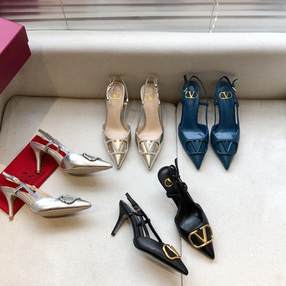 VLOGO SIGNATURE SILVER PATENT LEATHER SLINGBACK PUMP