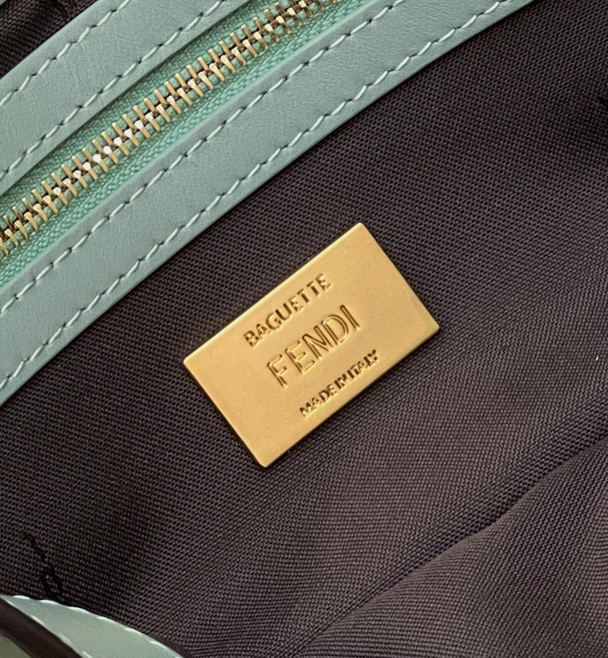 BAGUETTE WITH FF MOTIF 27 IN VIRIDIAN GREEN SOFT LAMBSKIN GOLD HARDWARE
