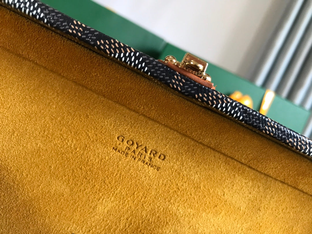 GRAND HÔTEL TRUNK BAG 24 IN BLACK GOYARDINE CANVAS AND TAN CALFSKIN