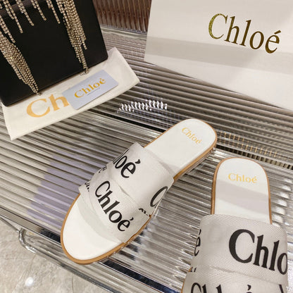 WOODY SLIPPER IN WHITE MIX BLACK CANVAS