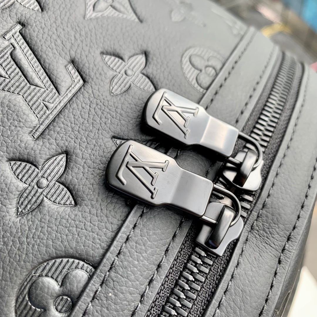 DISCOVERY PM BACKPACK 38 IN BLACK MONOGRAM LAMBSKIN