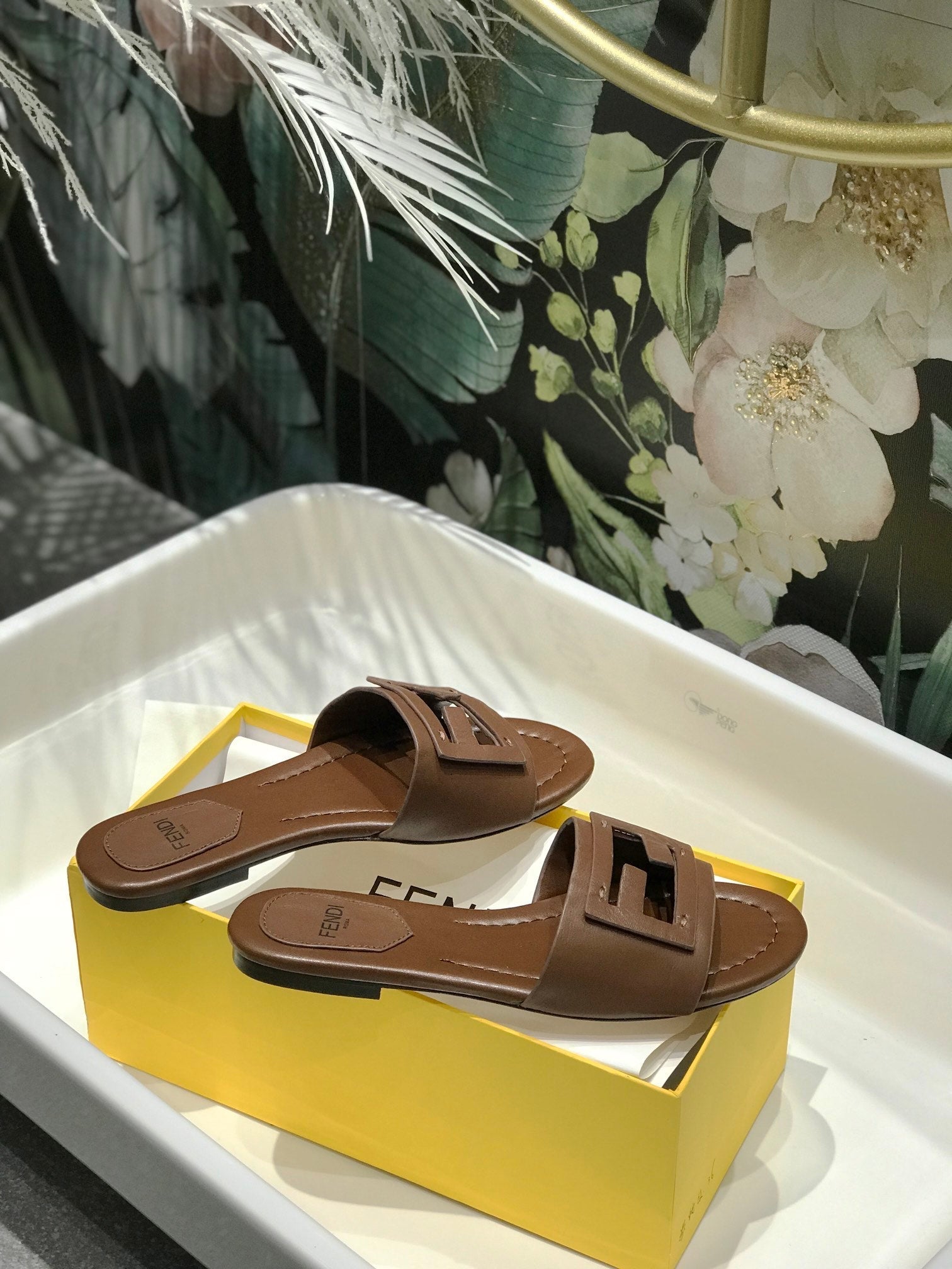 FENDI BAGUETTE SLIDES IN COFFEE BROWN LAMBSKIN