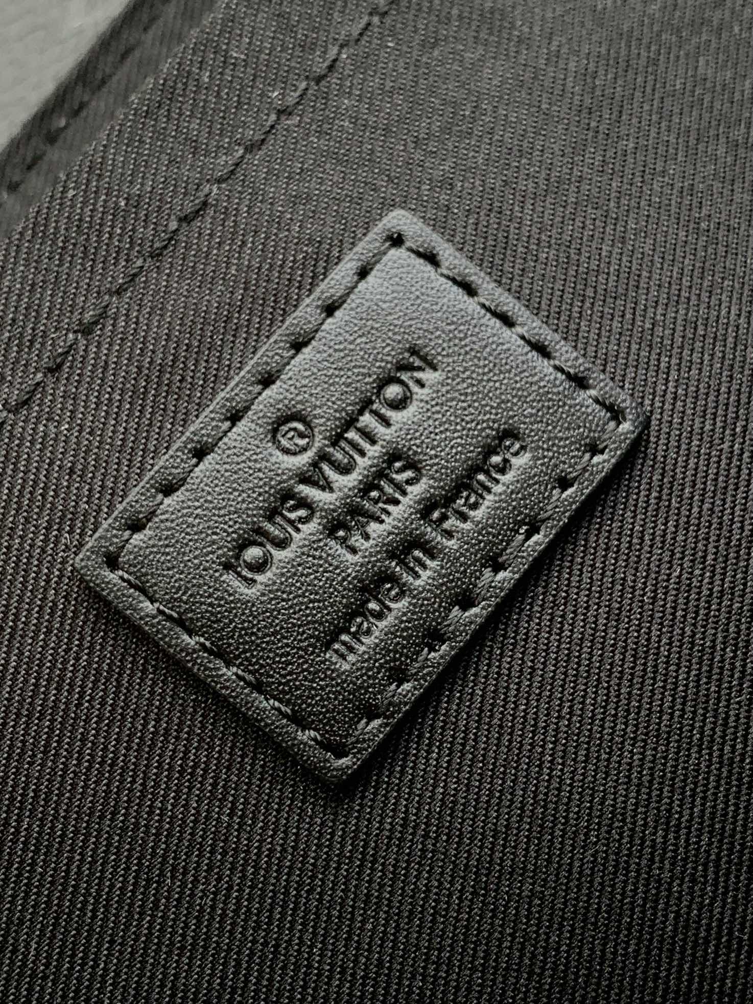 S-CAPE MESSENGER BAG 28 IN BLACK MONOGRAM ECLIPSE CANVAS