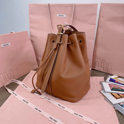 BUCKET BAG 29 IN BRONZE BROWN CALFSKIN