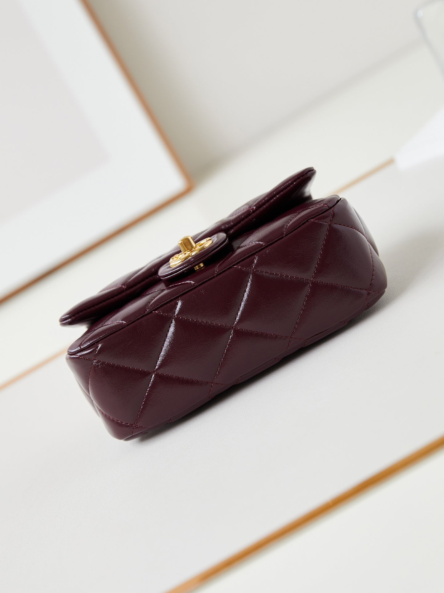 FLAP BAG WITH TOP HANDLE 19 IN WINE RED OIL-WAX LAMBSKIN GOLD HARDWARE
