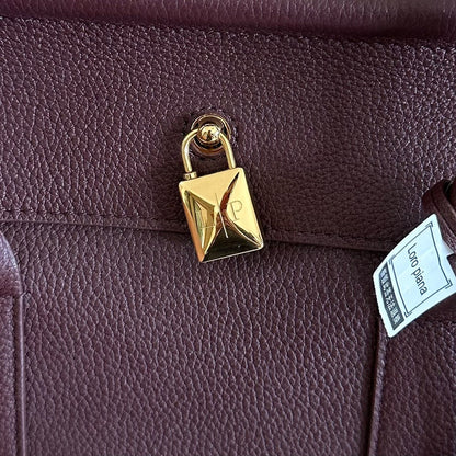 LOOM BAG 25 IN WINE PURPLE CALFSKIN WITH GOLD HARDWARE
