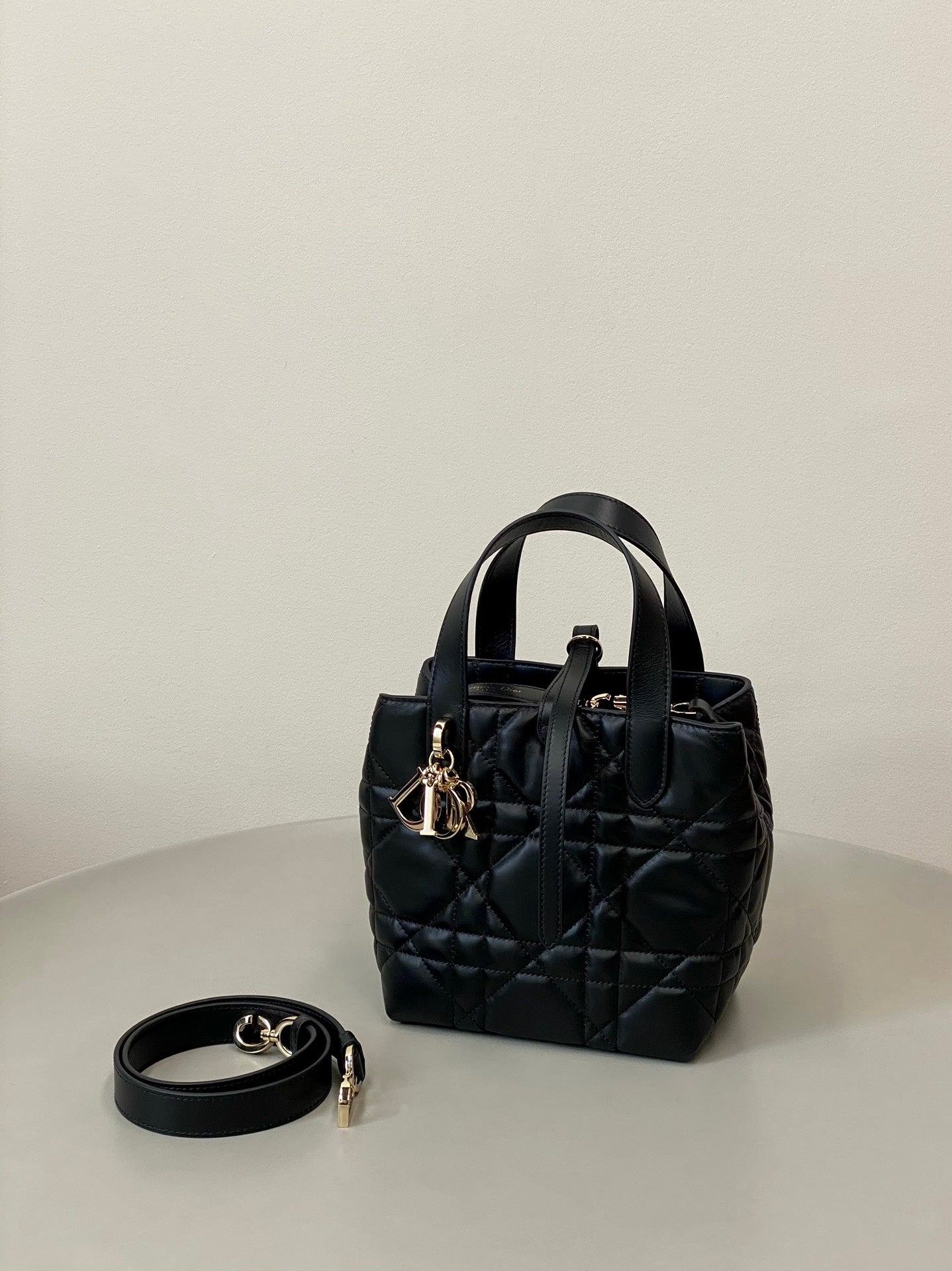 MINI TOUJOURS BUCKET BAG 18 IN BLACK CANNAGE CALFSKIN