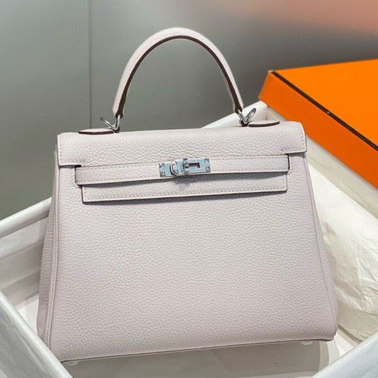 HERM Kelly 25cm Retourne Bag In Mauve Pale Clemence Leather