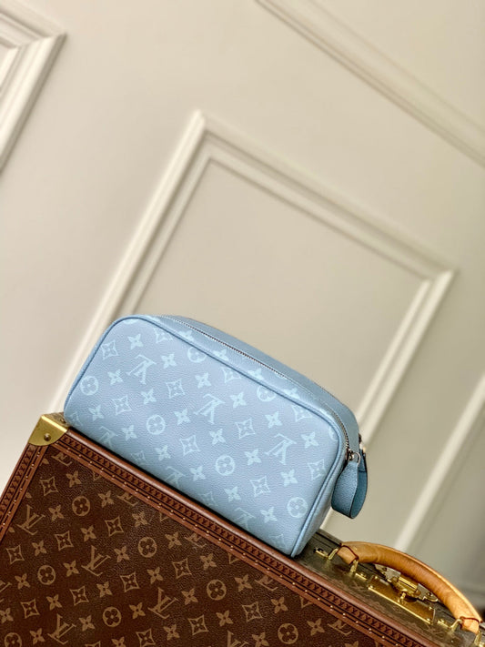 DOPP KIT 28 IN BLUE MONOGRAM COATED CANVAS