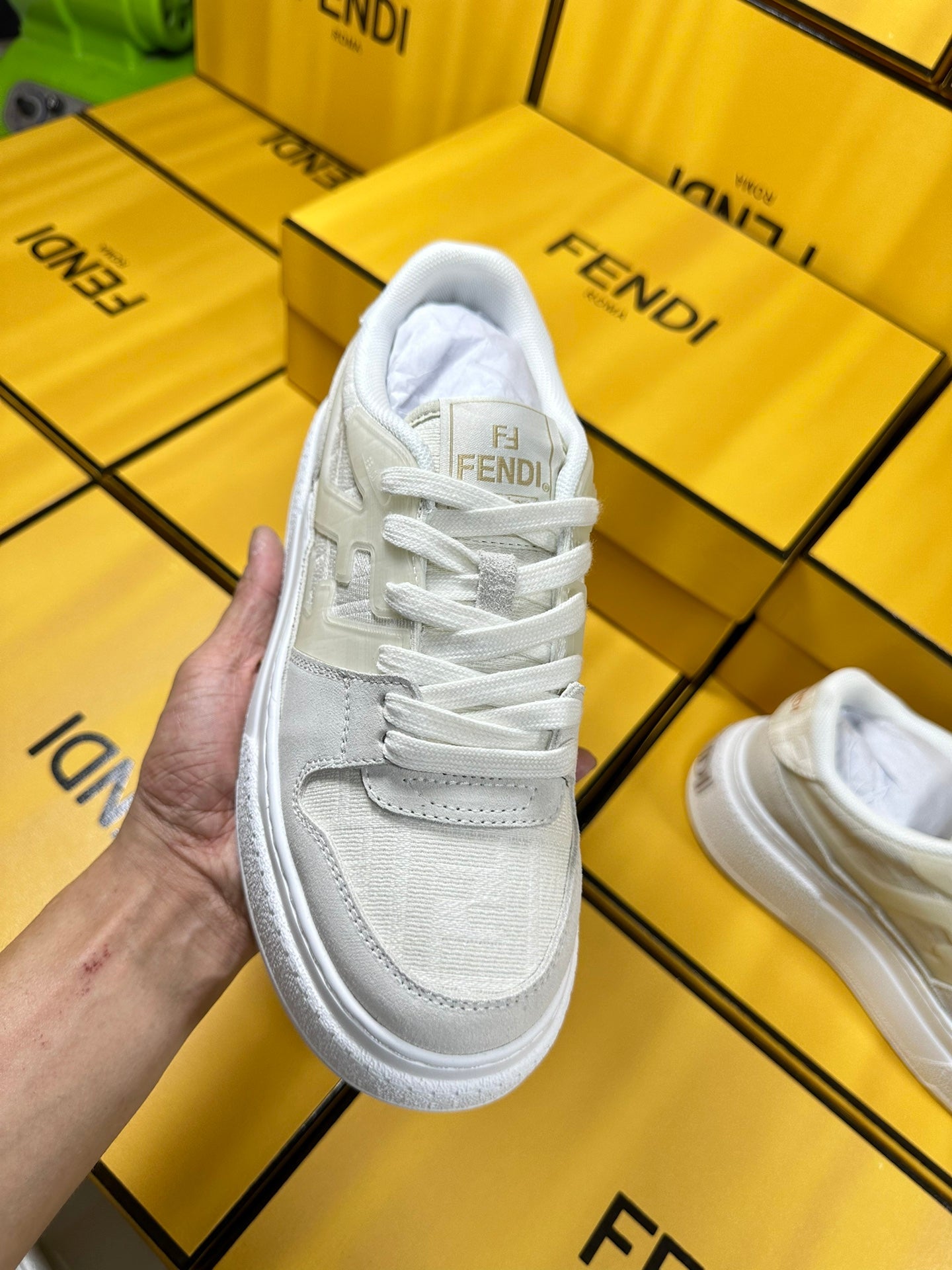 FENDI THICK-SOLDED SNEAKER IN WHITE SUEDE AND MONOGRAM FABRIC