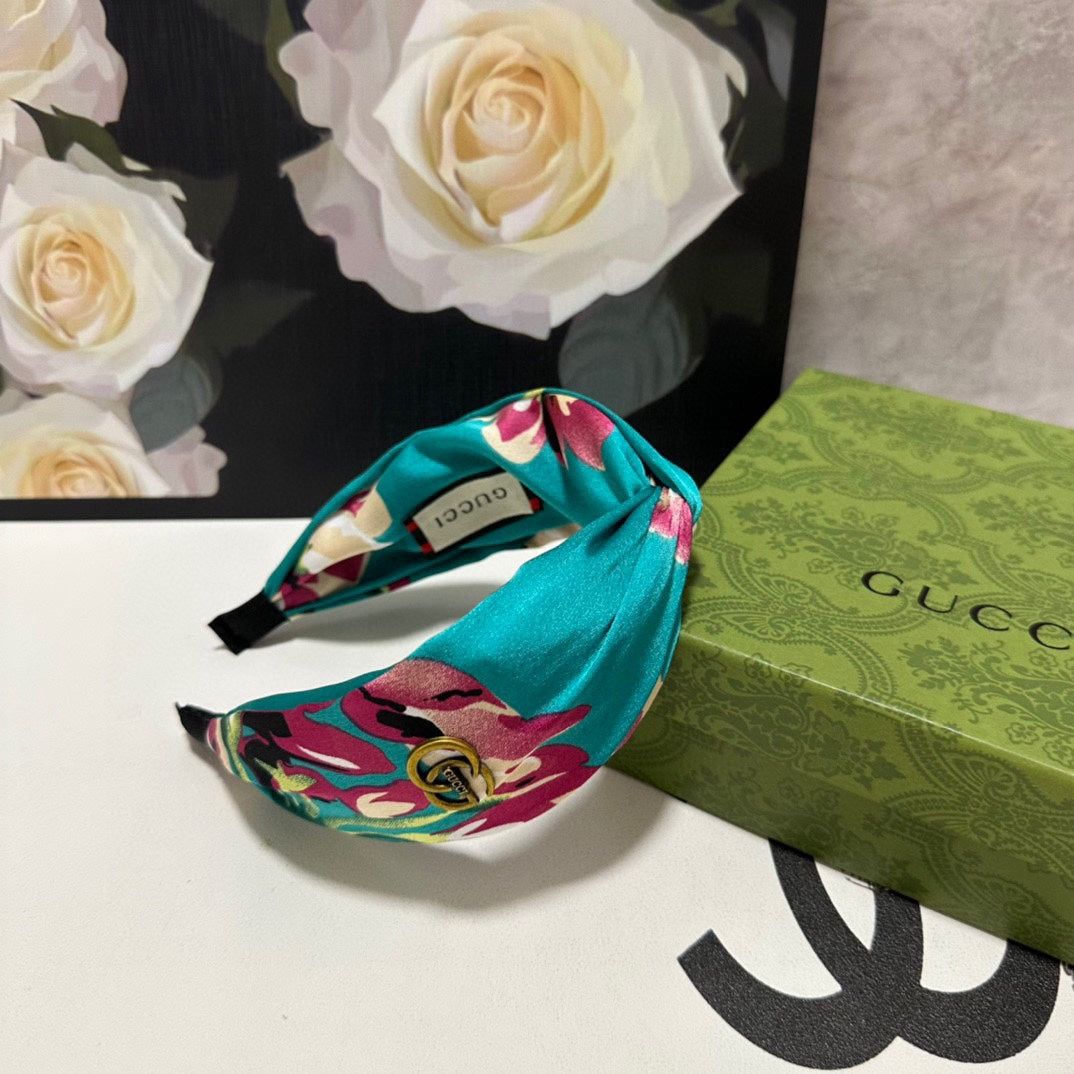 HAIRBAND IN TURQUOISE GREEN FLORAL SILK 252676