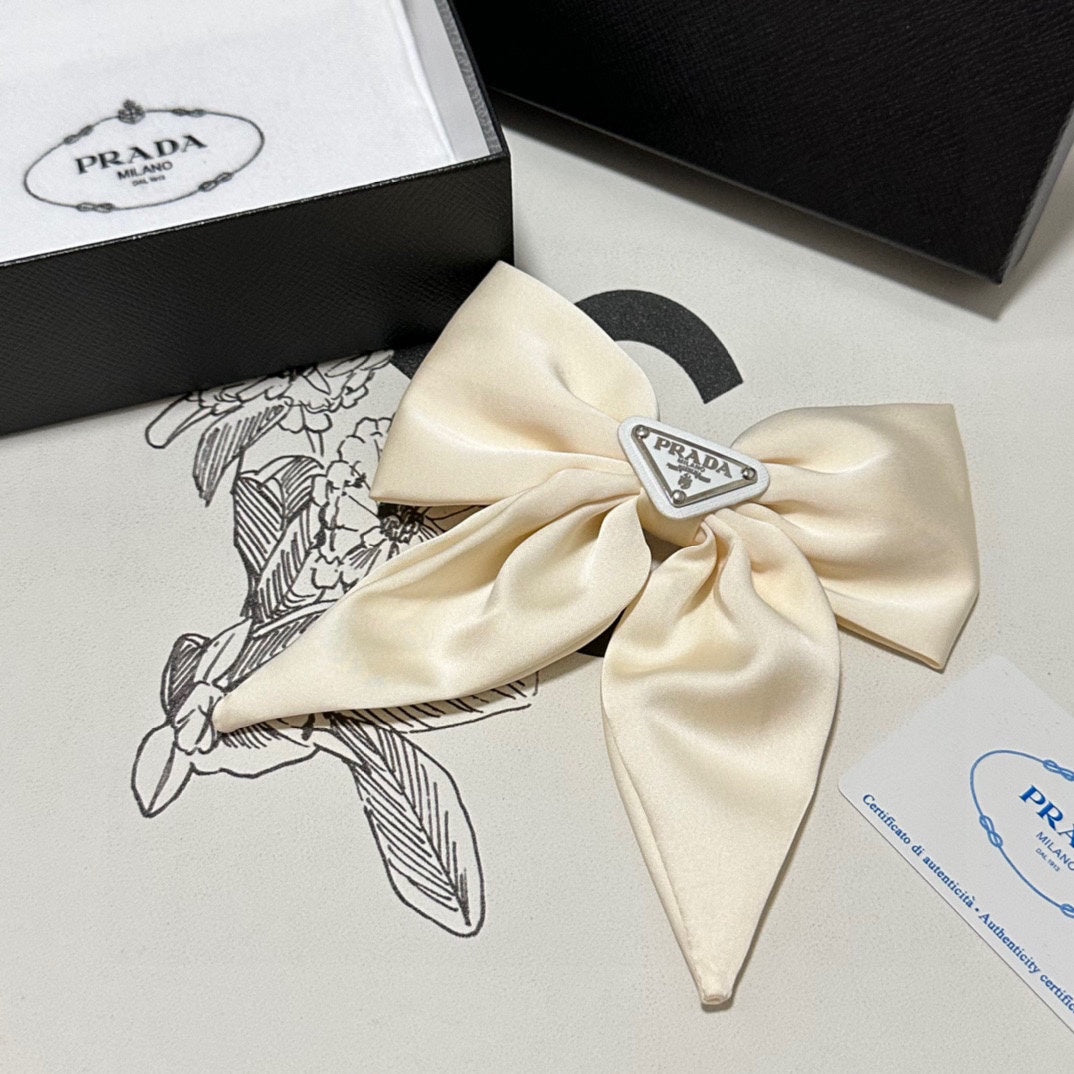 BOW-KNOT HAIR CLIP IN EGG SHELL SILK 358294