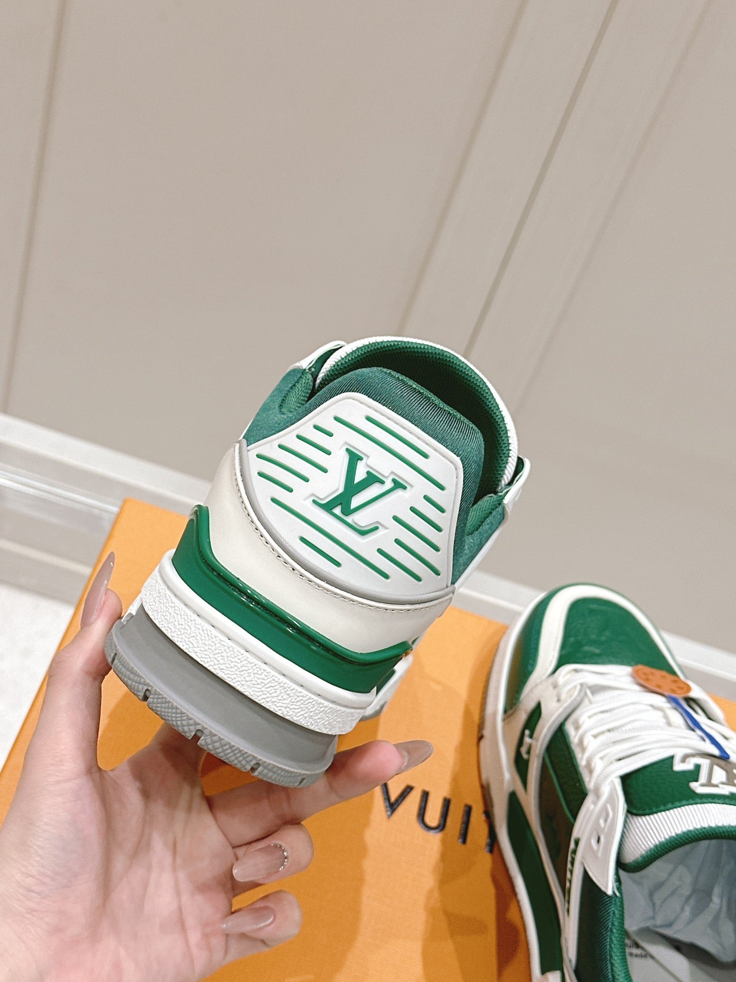 LV TRAINER SNEAKER IN BORNEO GREEN GRAINED CALFSKIN