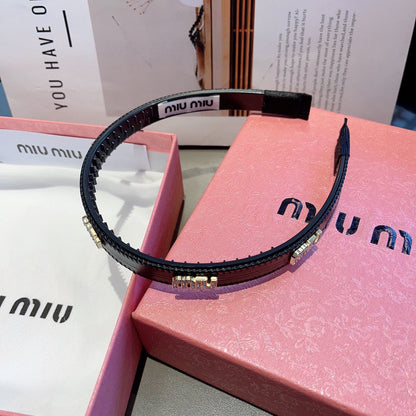 HEAD BAND IN BLACK LAMBSKIN AND RESIN 417299
