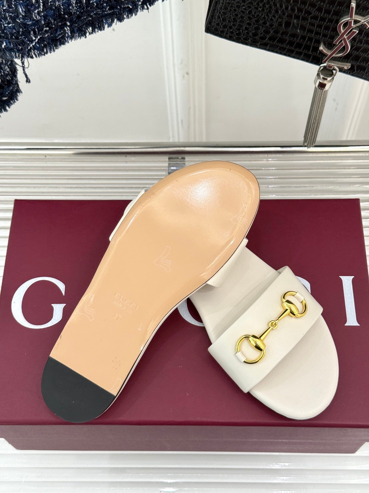SLIDE SANDALS IN WHITE CALFSKIN WITH GOLD HARDWARE