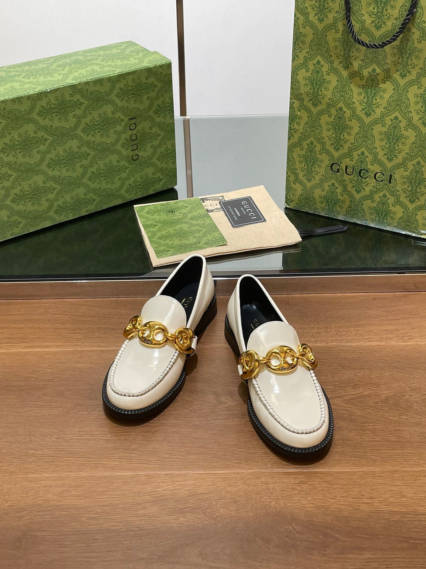 GG LOAFER SHOES IN WHITE CALFSKIN WITH GOLD HARDWARE