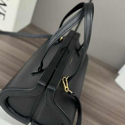 CYLINDER BAG 25 IN BLACK CALFSKIN