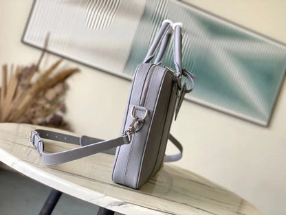 PORTE-DOCUMENTS VOYAGE PM 36 IN DOVE GRAY CALFSKIN