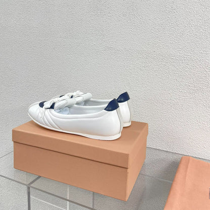 White Leather Ballet Flats With Black