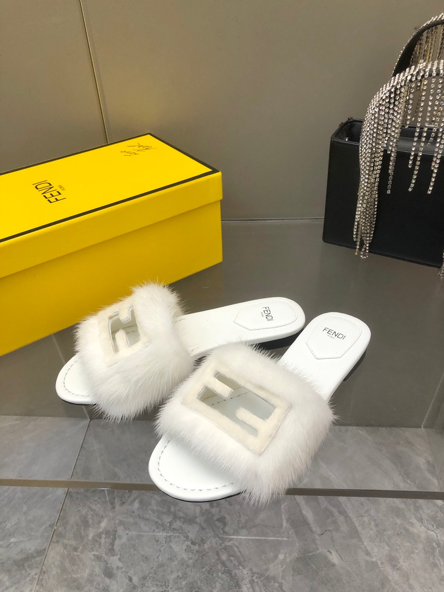 FENDI BAGUETTE MINK SLIDE SLIPPER IN WHITE FUR