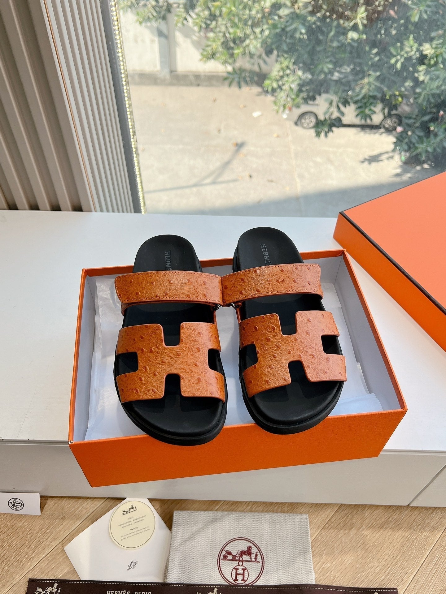 CHYPRE SANDAL IN VIVID ORANGE GRAINED CALFSKIN