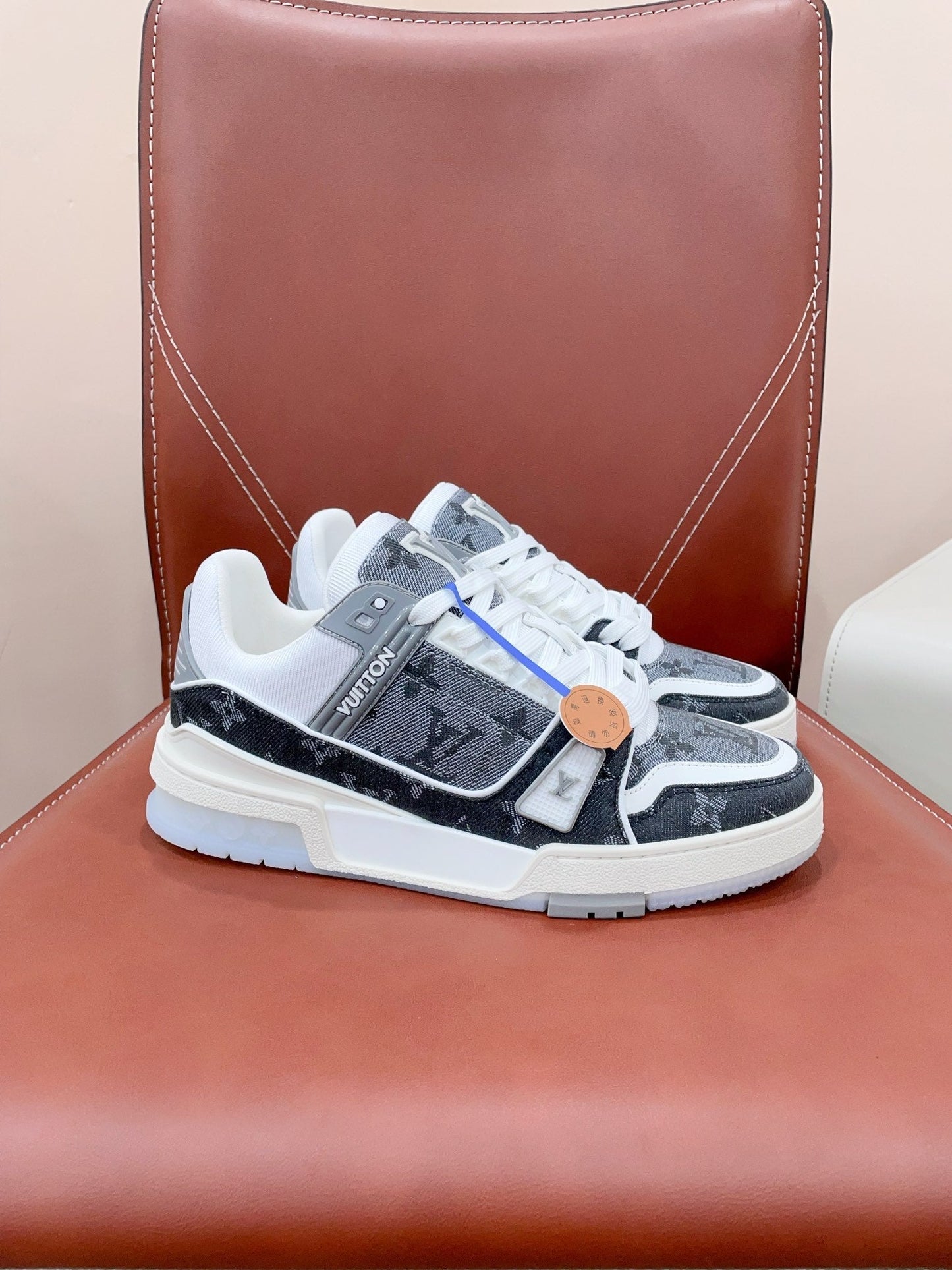 LV TRAINER SNEAKER IN DOVE GRAY MONOGRAM DENIM