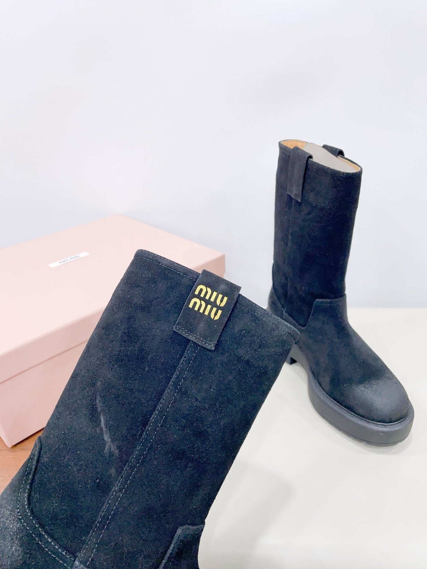 THICK-SOLED BOOTS IN BLACK SUEDE