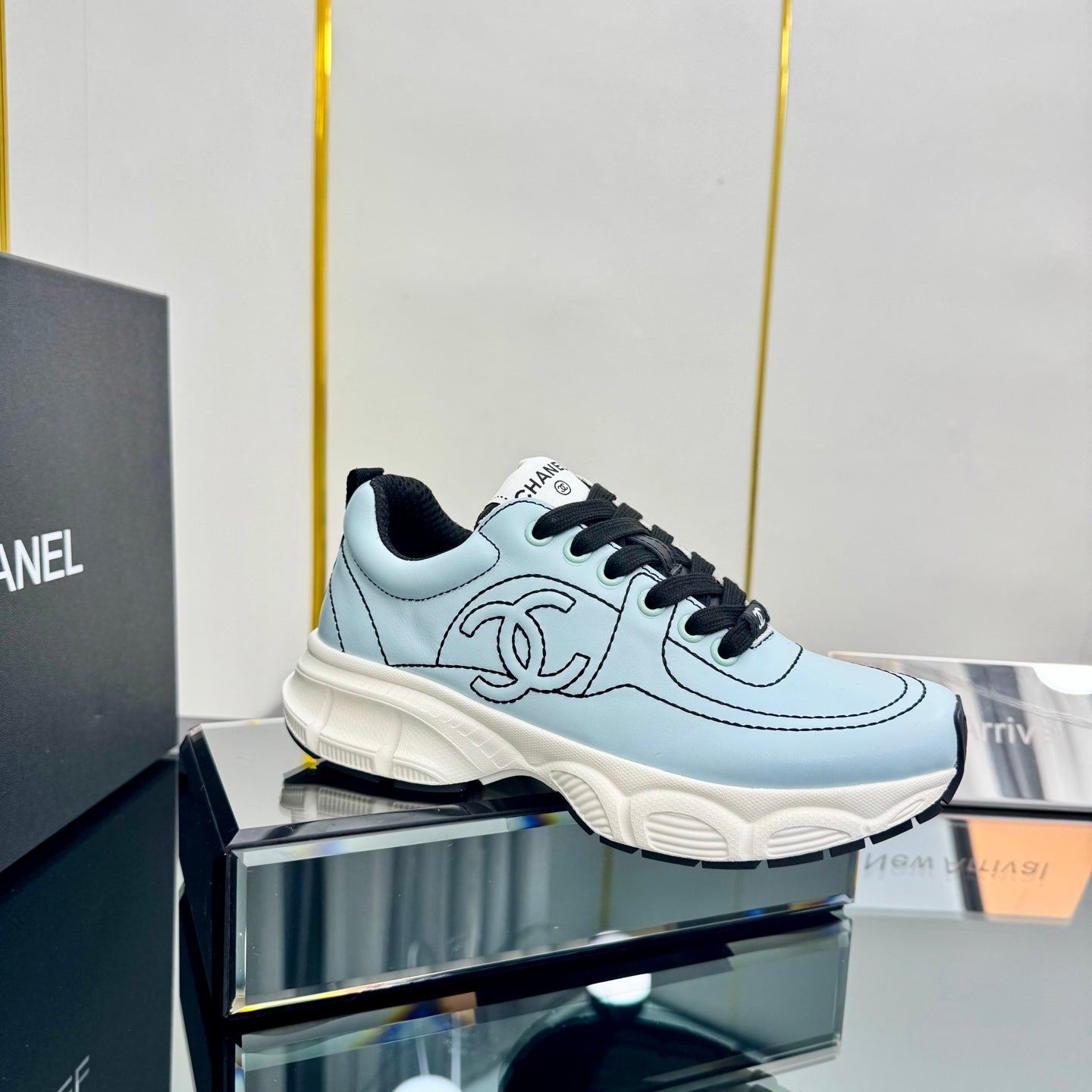 TRAINERS SNEAKER IN LIGHT BLUE CALFSKIN WITH BLACK EMBROIDERED