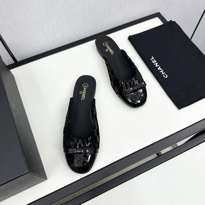 BOW MULE IN BLACK FABRIC AND CALFSKIN