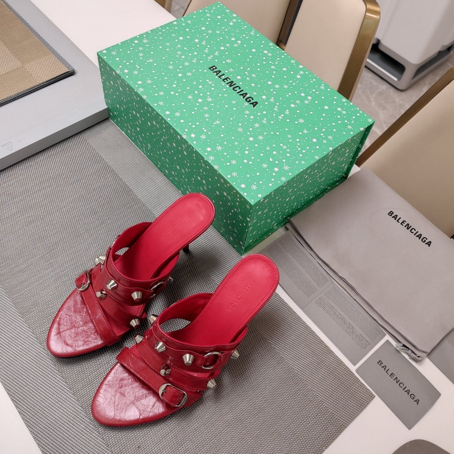 STRAPPY HIGH-HEELED SANDALS IN RED STUDDED WAX-OIL SHEEPSKIN