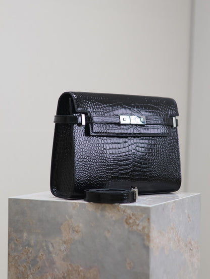 MANHATTAN MEDIUM 29 IN BLACK CROCODILE-EMBOSSED CALFSKIN SILVER BUCKLE