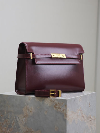 MANHATTAN MEDIUM 29 IN WINE RED SMOOTH CALFSKIN GOLD BUCKLE