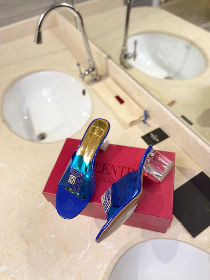 HIGH MULE 60MM IN COBALT BLUE SHEEPSKIN AND TRANSPARENT PVC