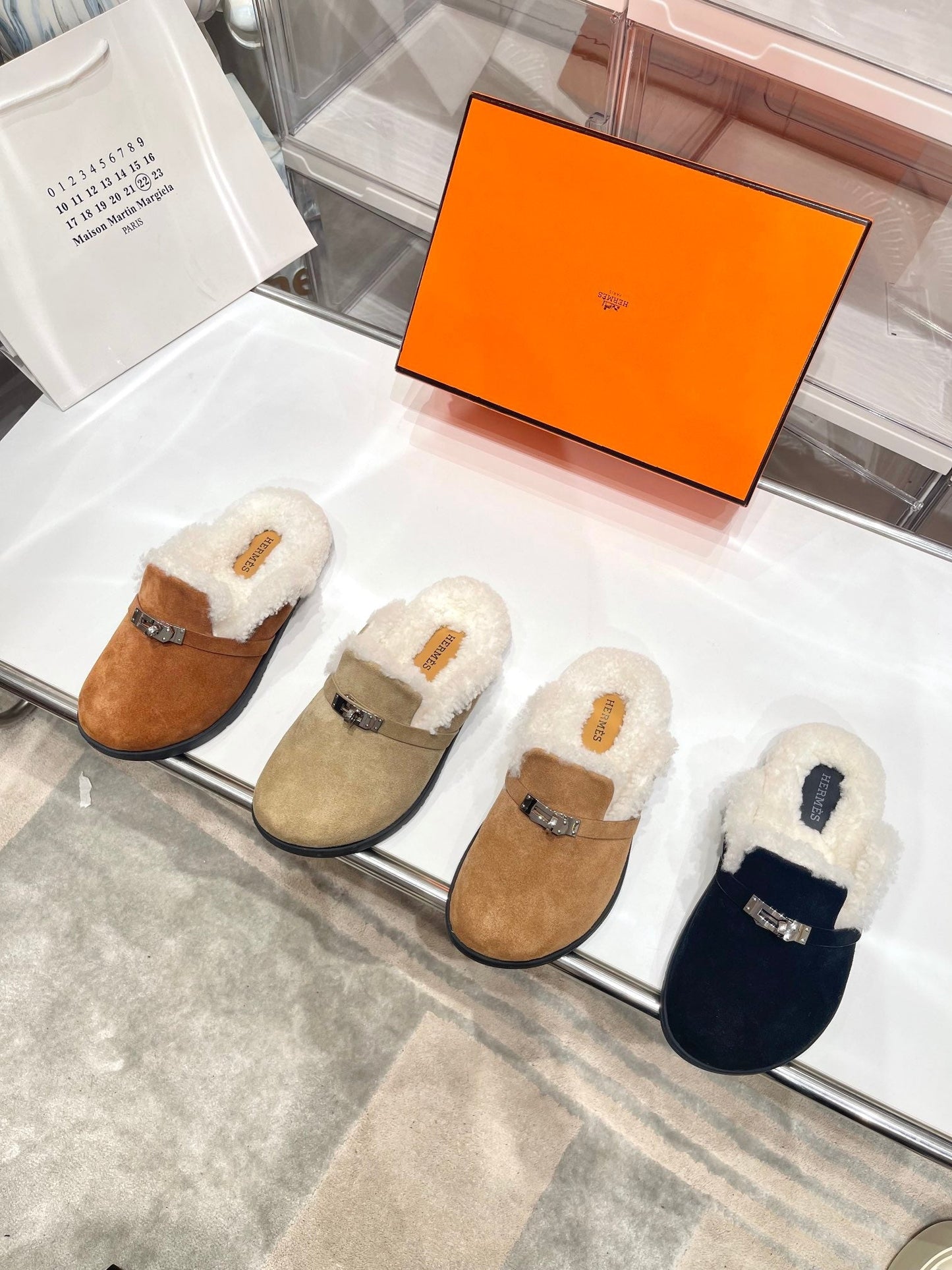 SLIP-ON MULE IN UMBER BROWN SUEDE AND SHEARLING LINING